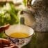 a hand holding a tea cup